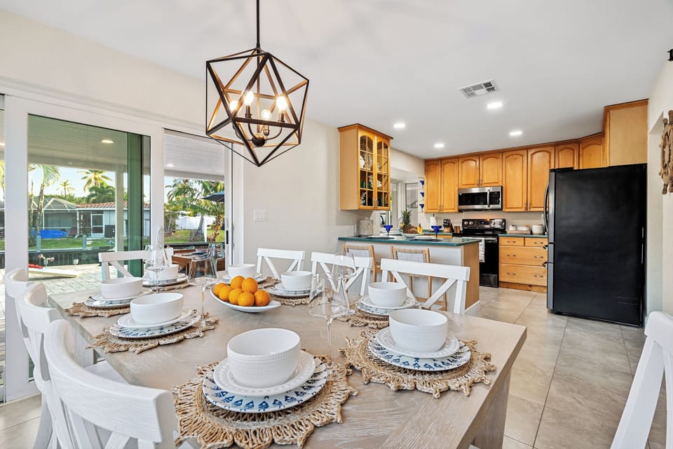 Bright dining area with spacious kitchen and easy patio access