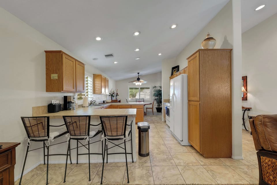Open-concept flow from kitchen to living space