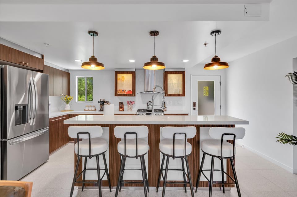 Updated kitchen with large island and bar seating