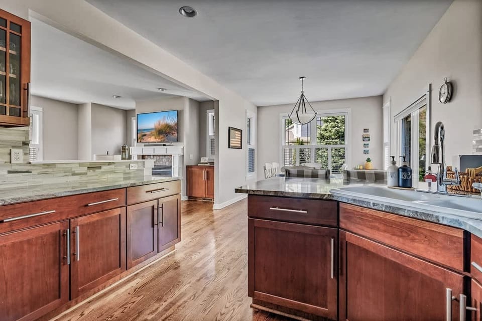 The kitchen island overlooks the main living area.
