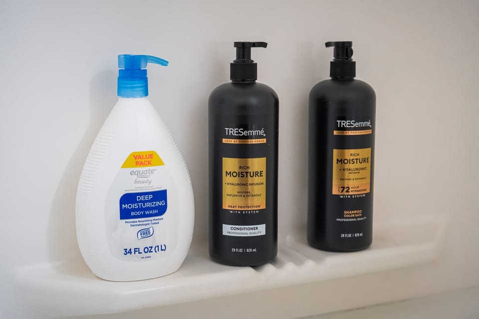 Shampoo, conditioner, and body wash provided in the shower