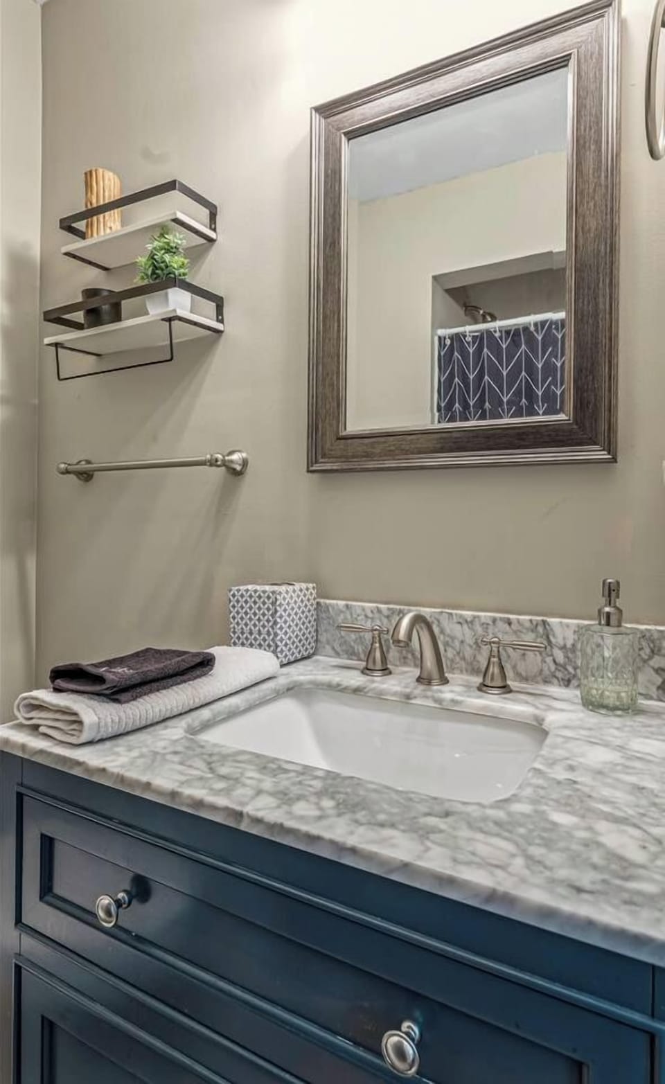 Elegant marble vanity with modern finishes and thoughtful decor