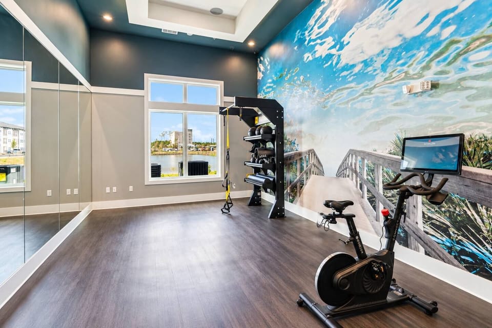 Stationary bikes and training equipment in the shared fitness center.