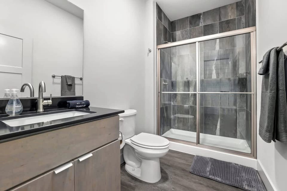Full bathroom with a glass walk-in shower