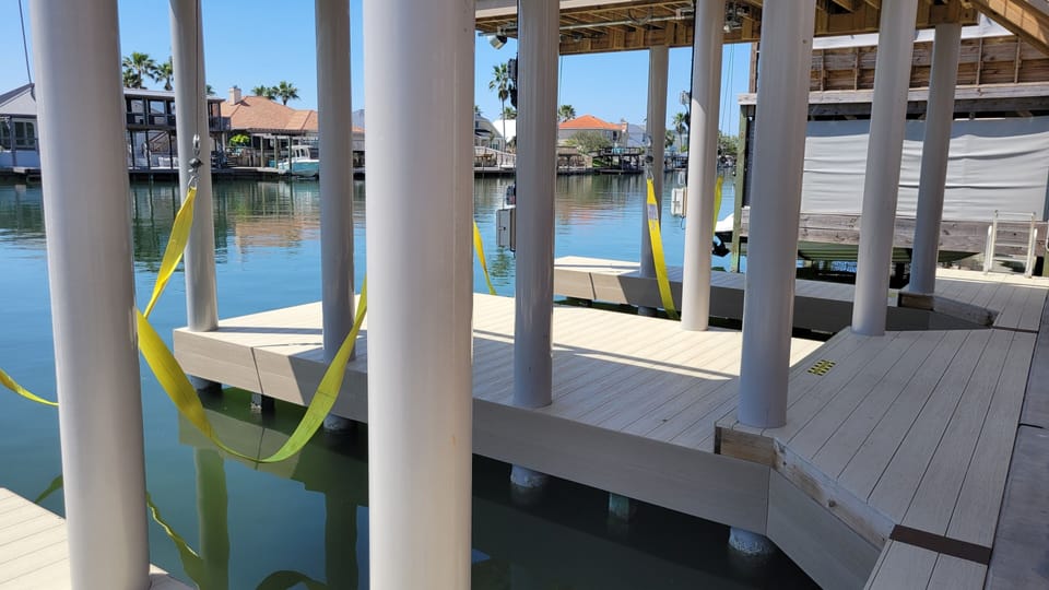 Two boat slips with lifts and additional docking on each side!