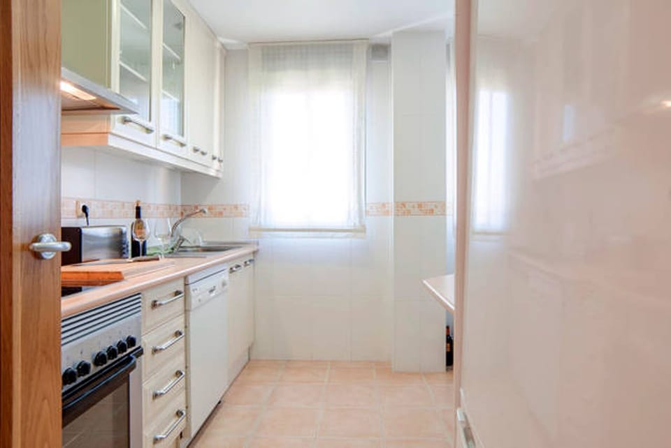 Fully equipped kitchen with modern appliances