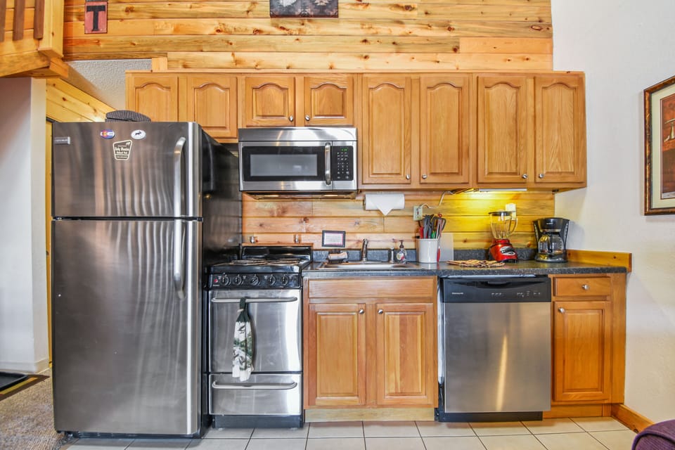Updated kitchen appliances with all the accouterments! 