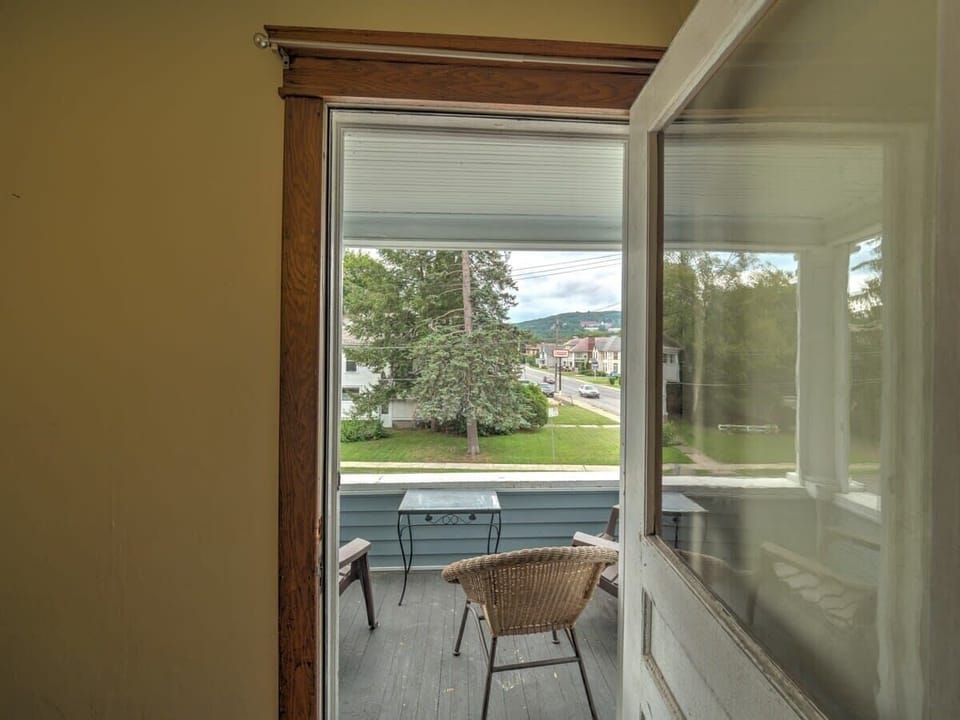 Second Floor Porch overlooking the block, and a view of Hartwick College