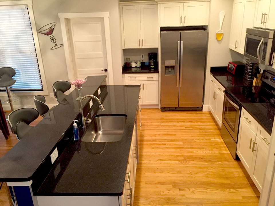 Spacious kitchen is fully stocked with everything a chef could want