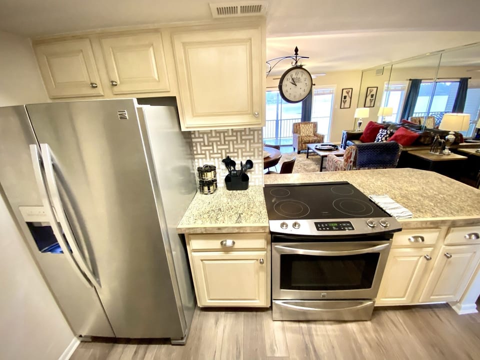 Our gourmet kitchen with granite counters will make cooking a meal enjoyable.
