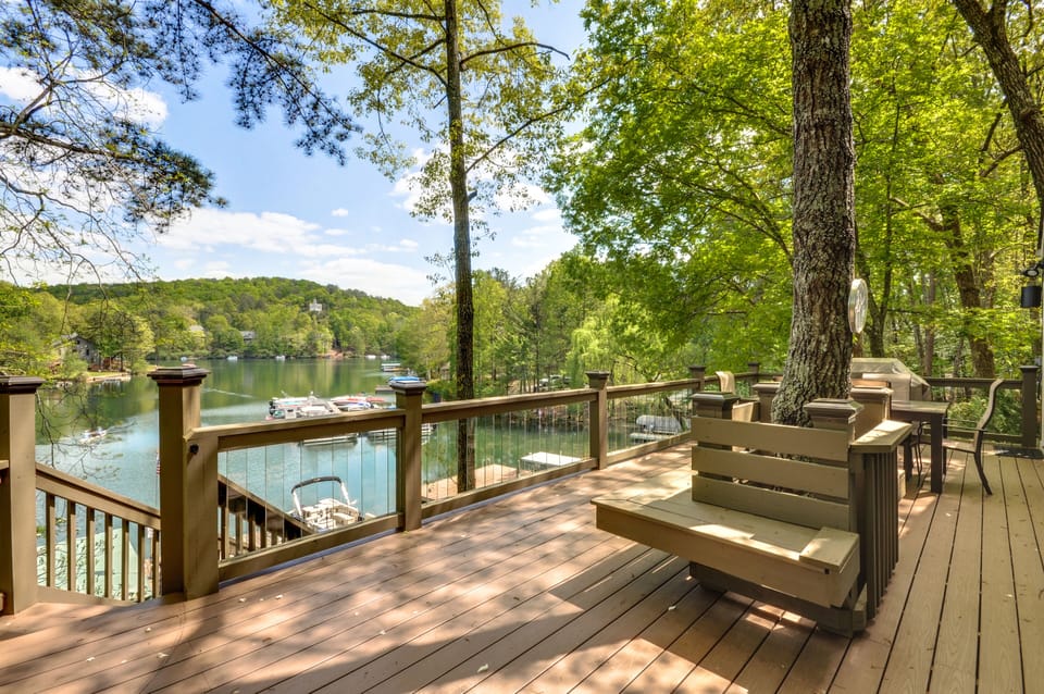 Built in seating on large deck.  Glass balusters and resin deck.