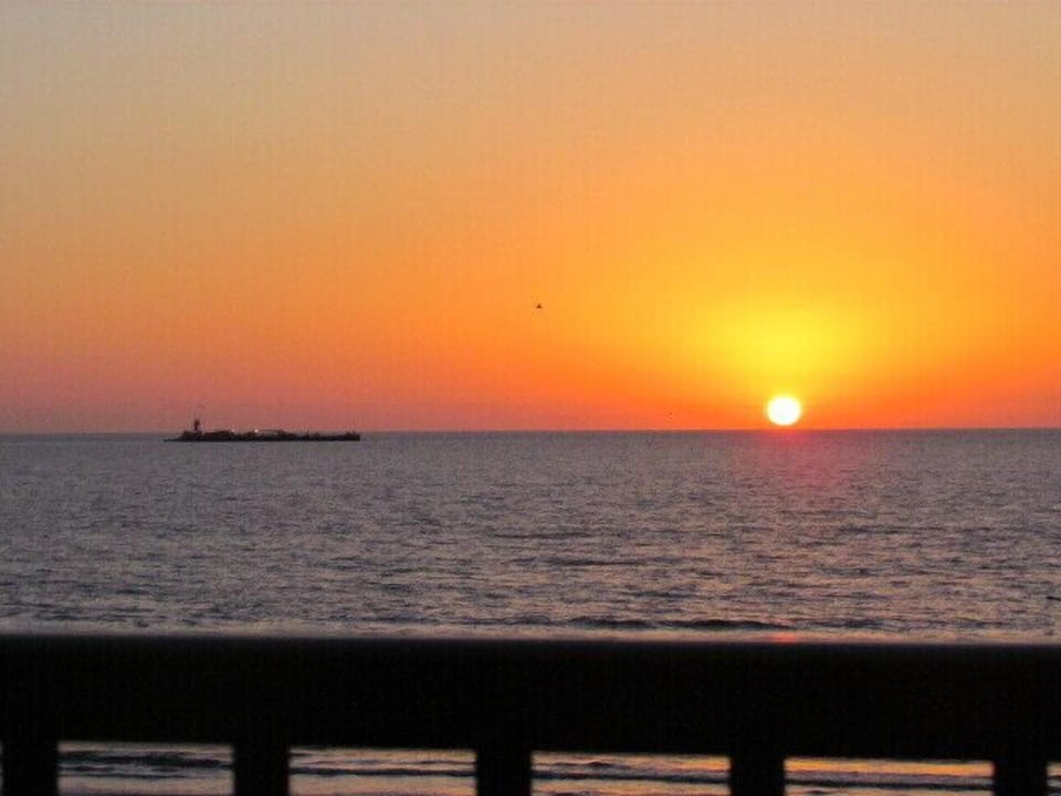 Wake up to this beautiful view of the sunrise from your bed!