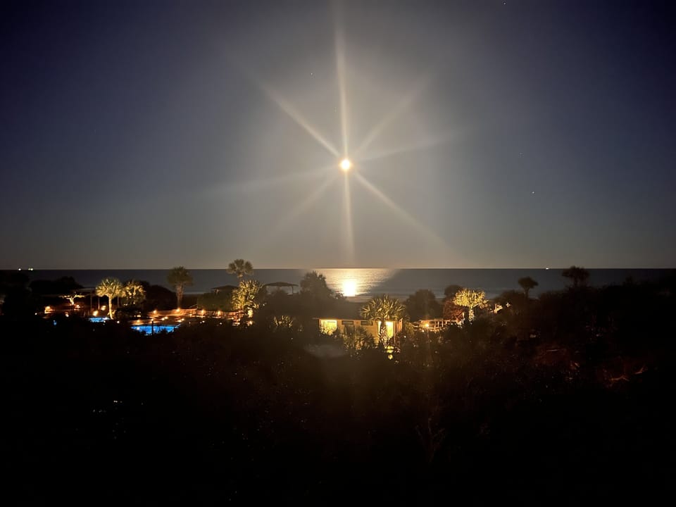 View of Moon over Atlantic from balcony.