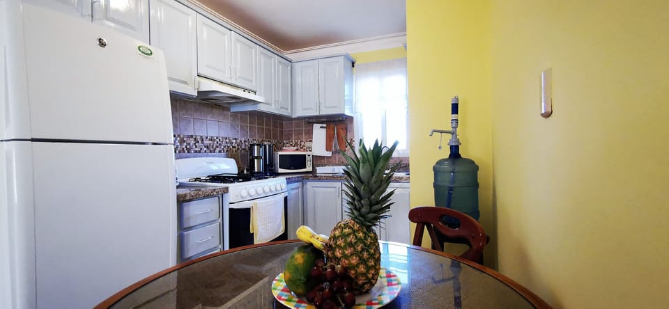 The fully equipped kitchen includes all you need to prepare delicious meals.