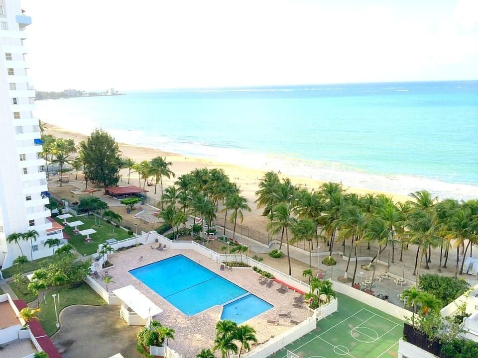 Upper view of Facilities and Beach! Ocean front Building! Beach just steps away!
