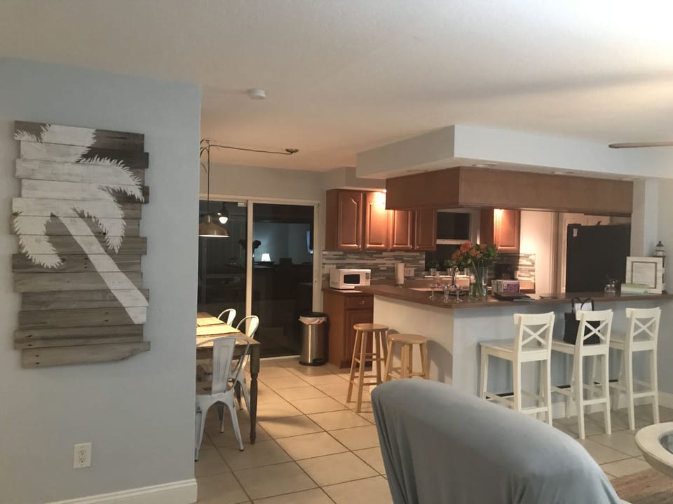 View from living room towards kitchen and bar.