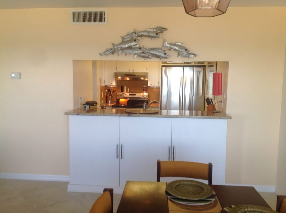 Kitchen storage and pass through