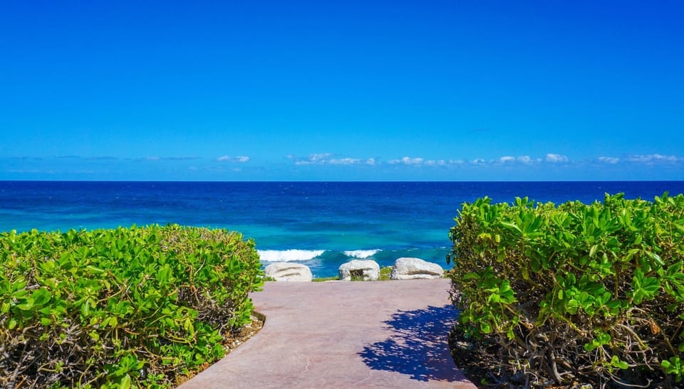 Entrance to walking path along Caribbean in front of our home