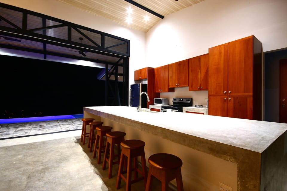 Kitchen, island, and pool