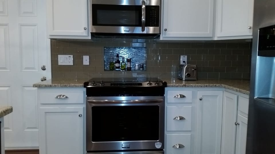 Gourmet Kitchen - Granite Counters, Glass Subway Tile, Stainless Appliances