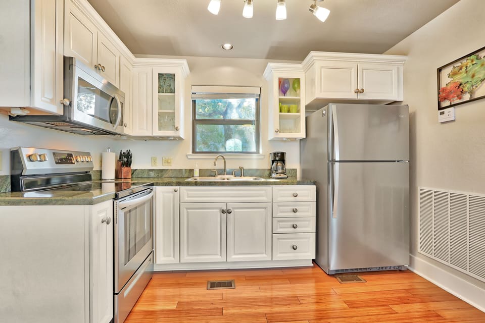 Fully appointed kitchen with stainless steel appliances