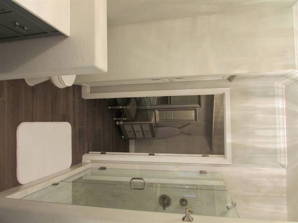 Fully upgraded bathroom with large walk in shower