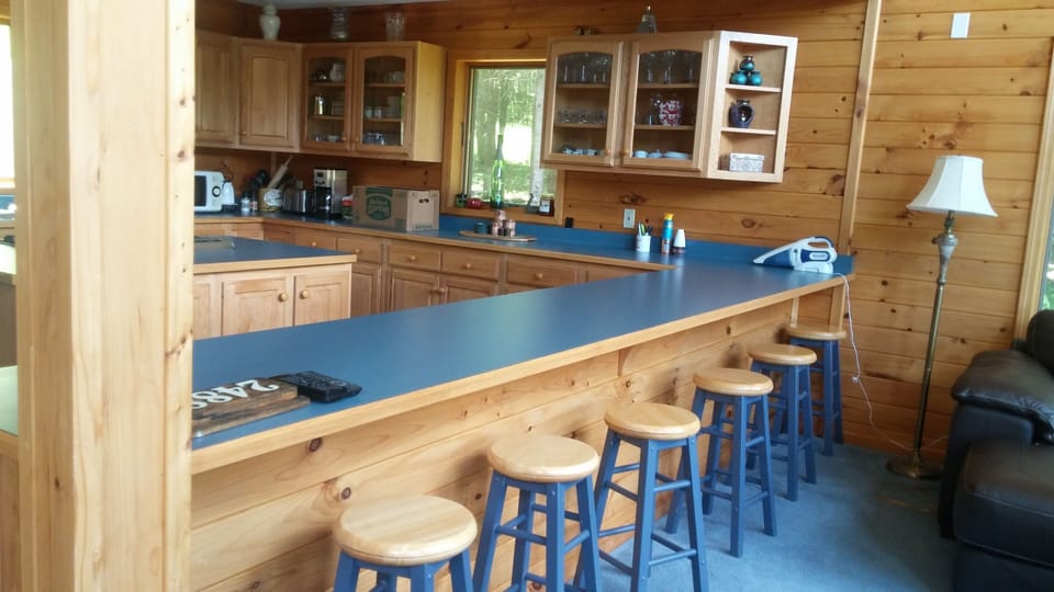 Eat-in kitchen counter with bar stools