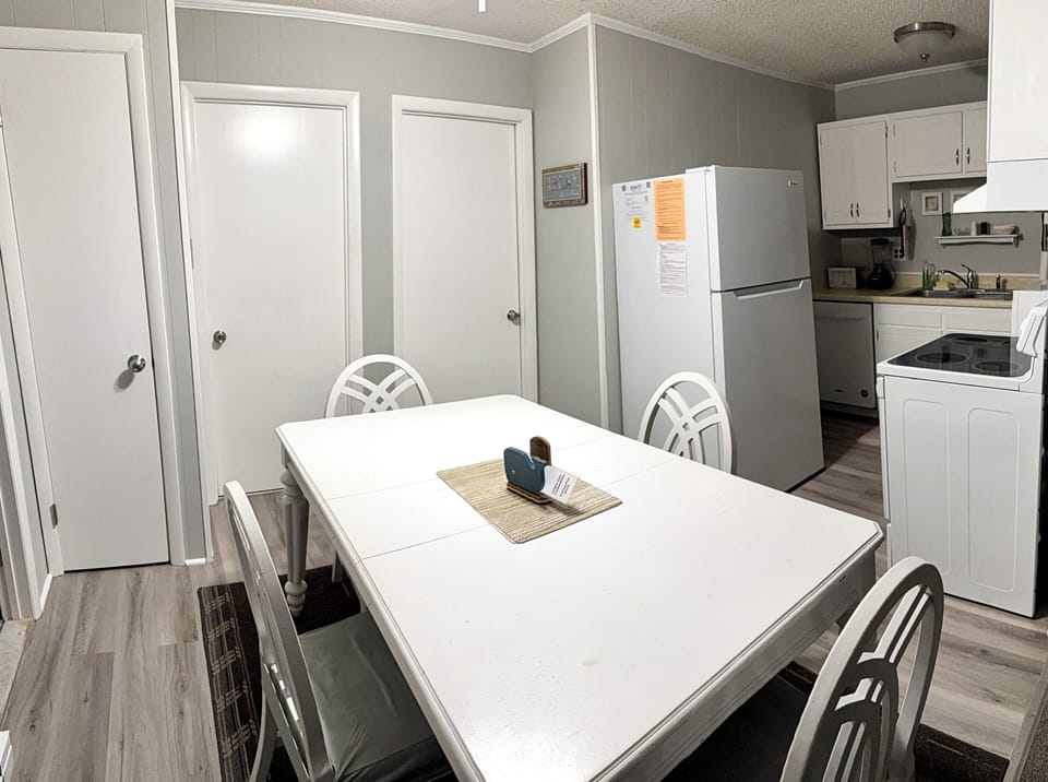 Dining/Kitchen Area - new paint and floor
