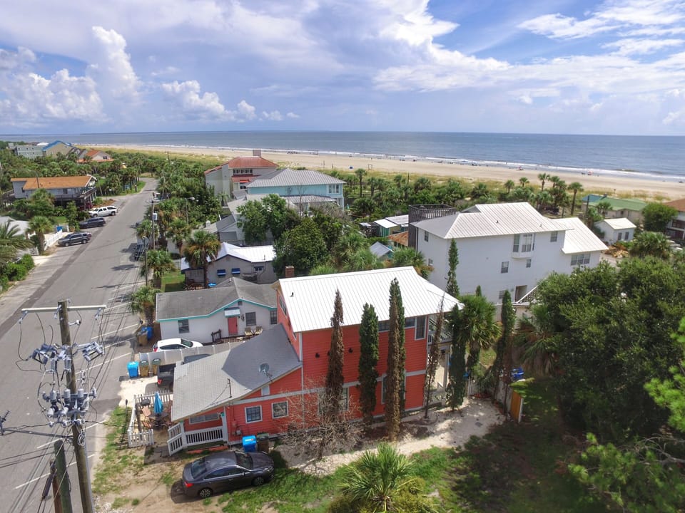 Coral House. The Peach Penthouse consists of the entire top floor of the house. 