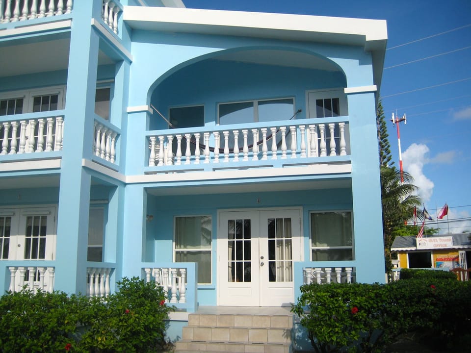 Condo A4 is on two levels: porch on the lower level & veranda on the upper