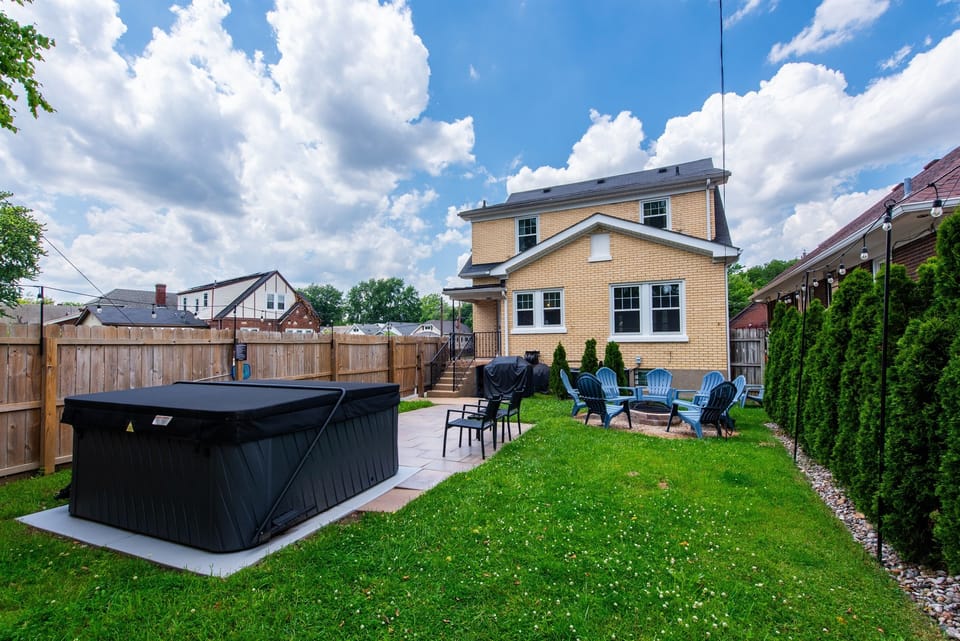 Private backyard with hot tub + fire pit 