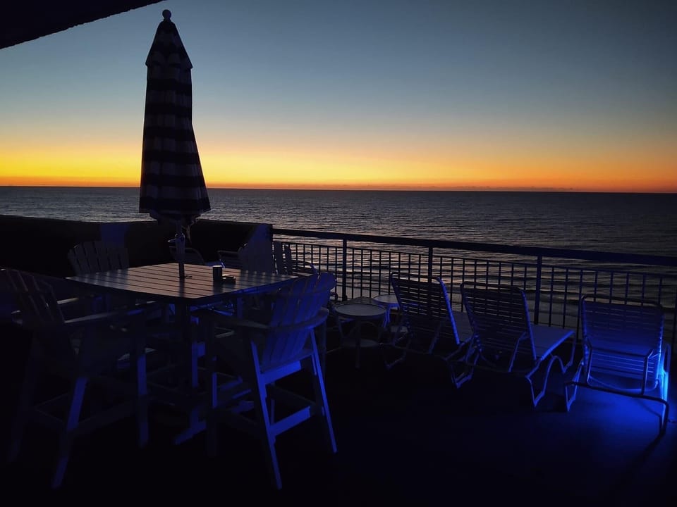 Rooftop Penthouse Sunrise View from exclusive private terrace.