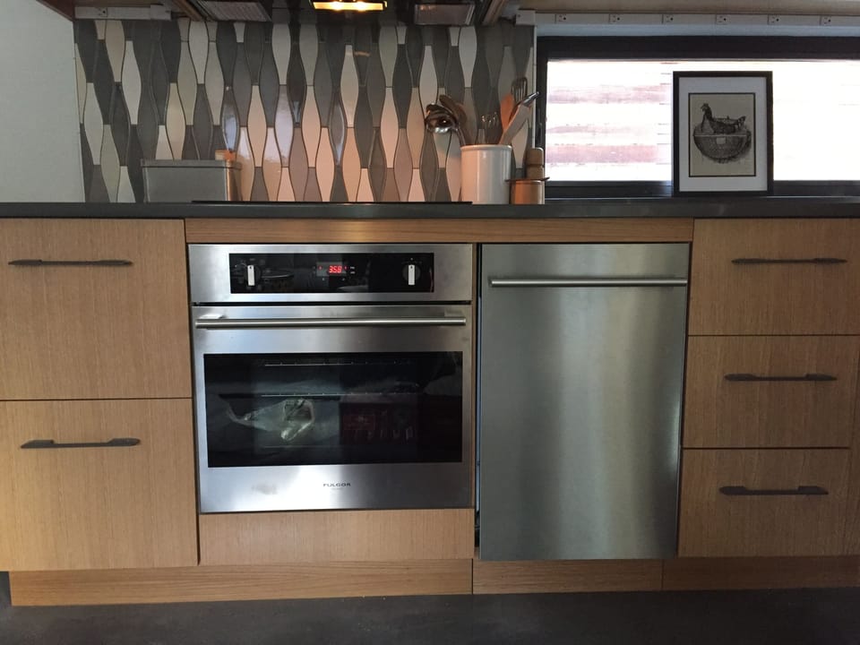 Stainless appliances includes oven and dishwasher
