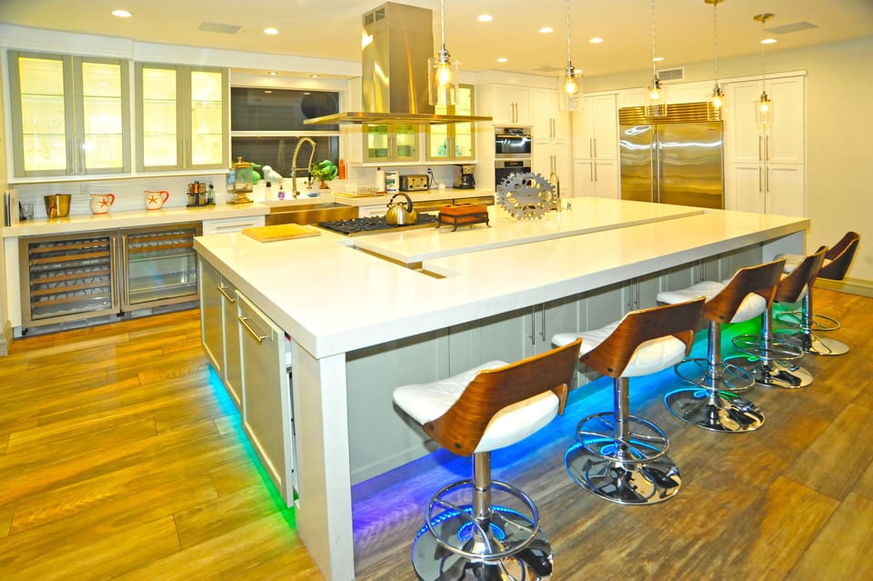 Gourmet Kitchen with Sub Zero Appliances and Wolf Gas Range Meile Espresso make