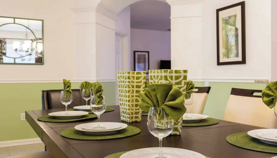 Elegant dining space with stylish décor, set for a perfect meal with family or friends.