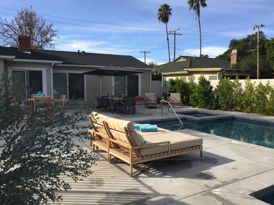Pool area facing back of house