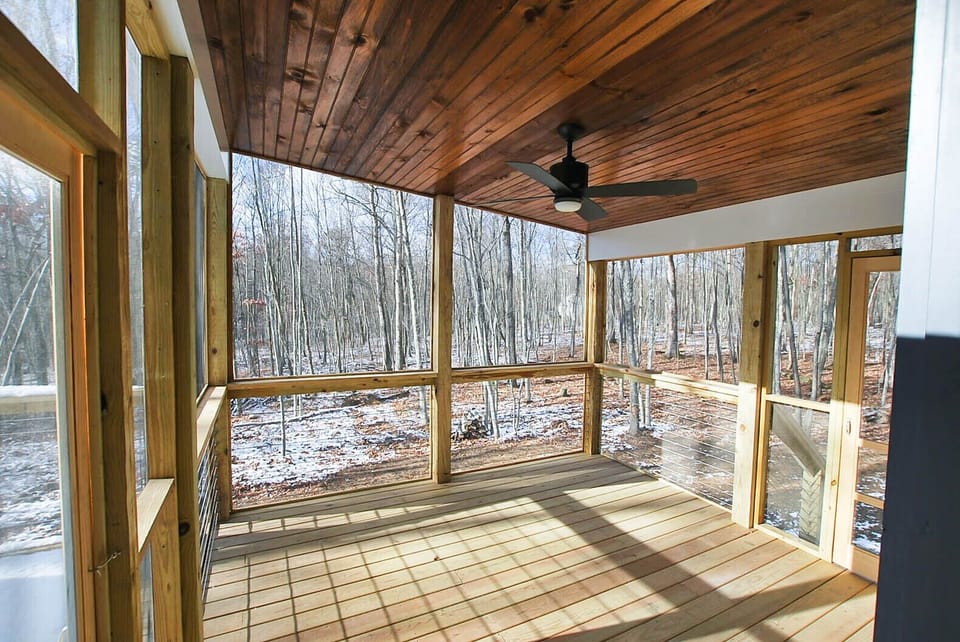 Gorgeous screened porch and open deck with BBQ and outdoor sectional