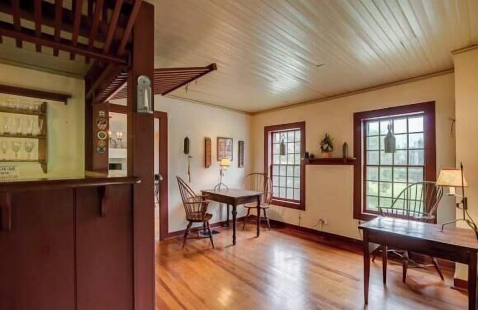 Bar/Tap Room.  These chairs and tables were replaced w 2 comfy fabric arm chairs