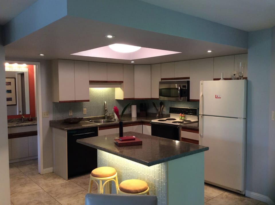 Our lovely kitchen with bar seats at the island