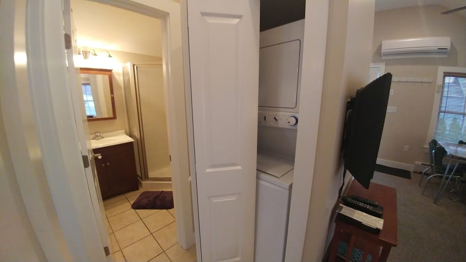 Small hallway with washer and dryer