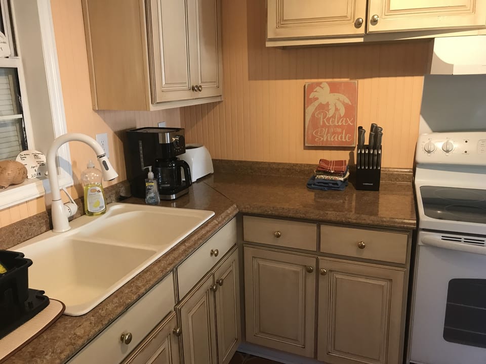 Kitchen. We provide drip coffee maker and filters. 