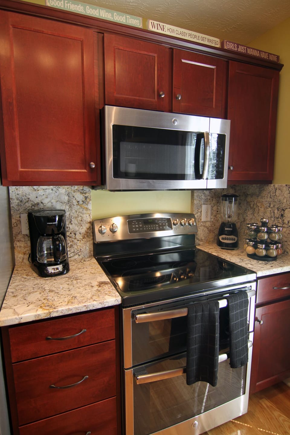 Kitchen Cooking area.  Stocked for the chef including a full selection of spices