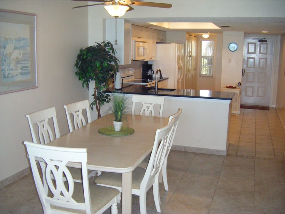 Large dining area with open access to kitchen for entertaining 