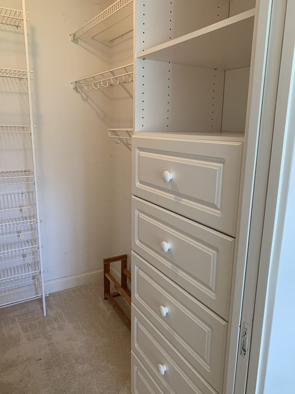 Master closet: double hanging racks, built-in drawers