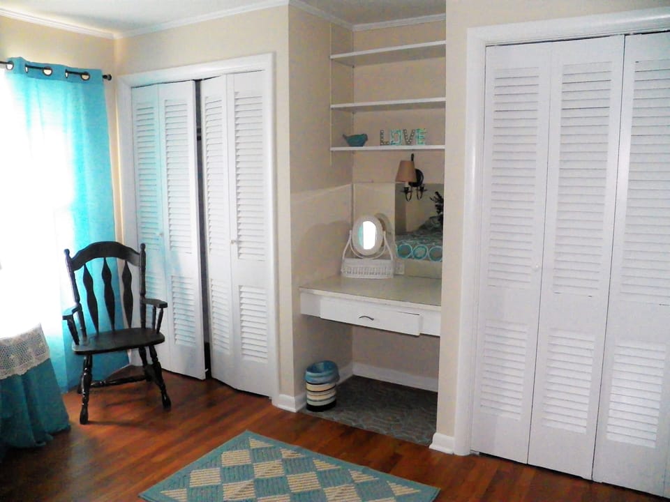 Bedroom 3. 2 closets, built in desk/ vanity area.