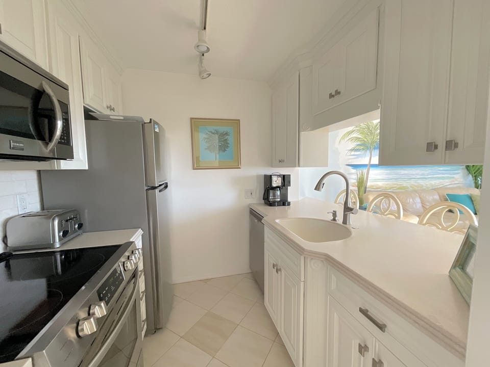 Pretty, clean kitchen with everything you need to enjoy your stay!