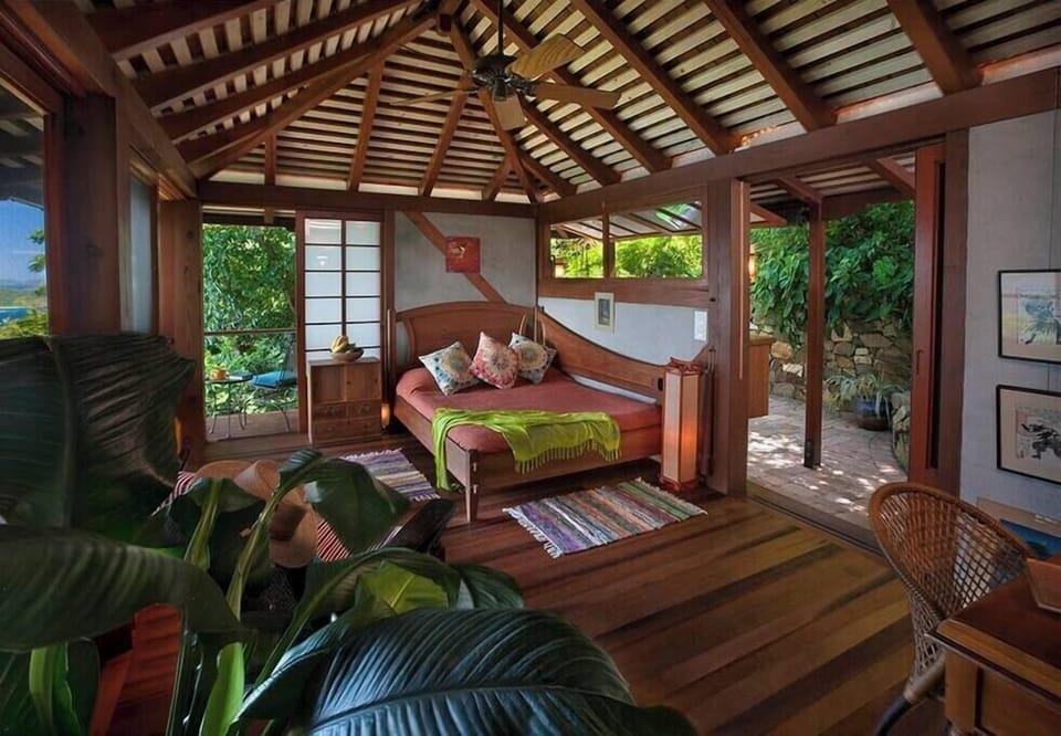 Cozy teak queen sized bed. 