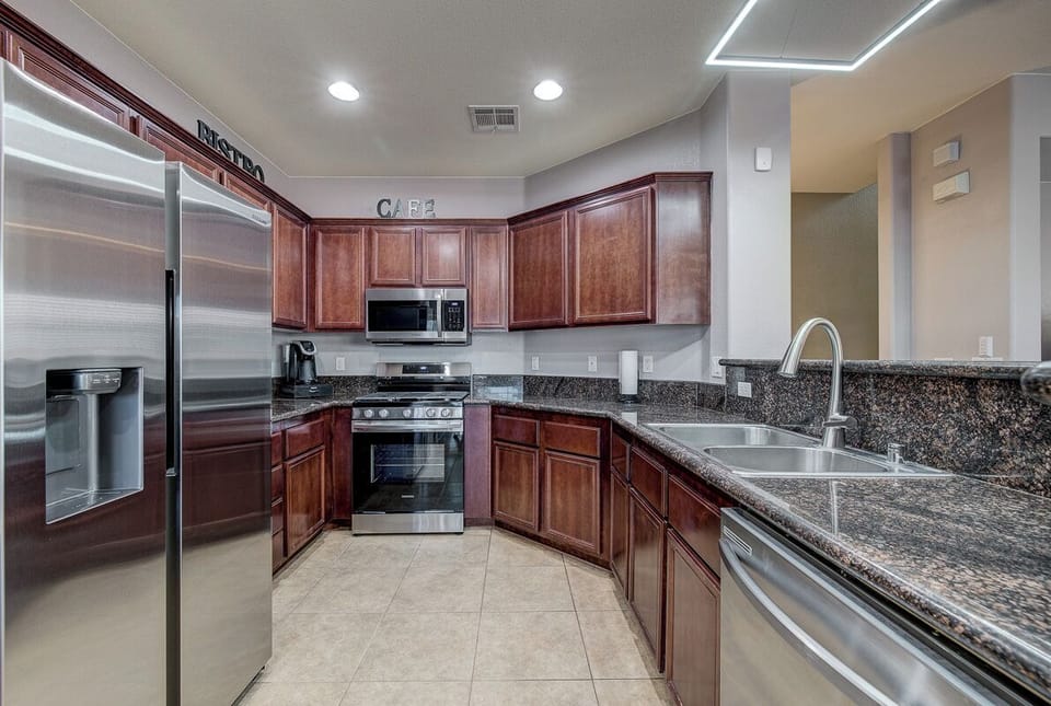 This fully stocked kitchen has everything you need for cooking and dining.
