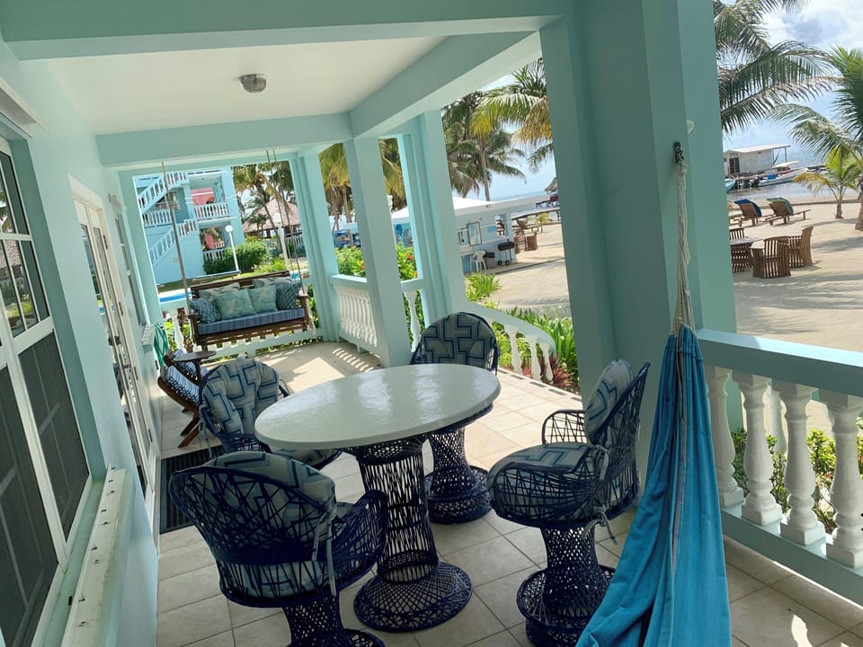 Porch with table, chairs, hammock & swing!