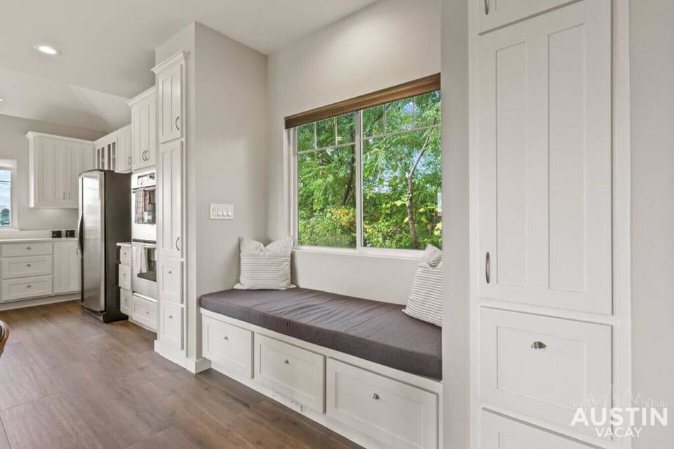 Day bed near the kitchen and dining area